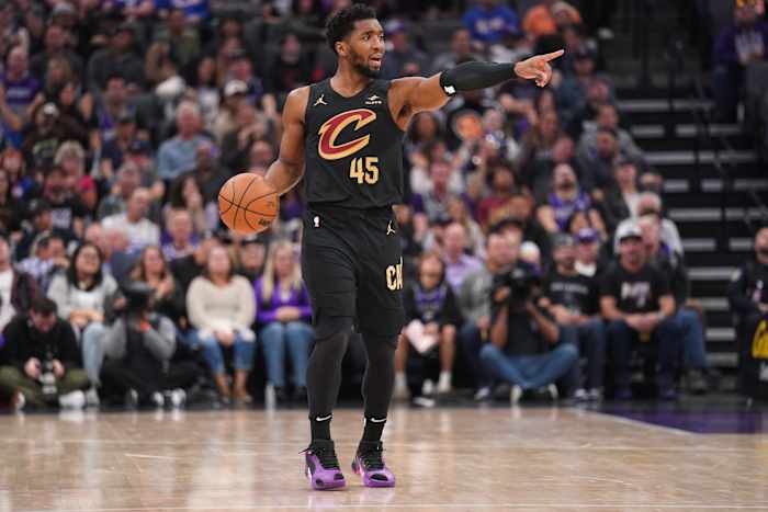 Nov 13, 2023; Sacramento, California, USA; Cleveland Cavaliers guard Donovan Mitchell (45) dribbles the ball against the Sacramento Kings in the second quarter at the Golden 1 Center. Mandatory Credit: Cary Edmondson-USA TODAY Sports